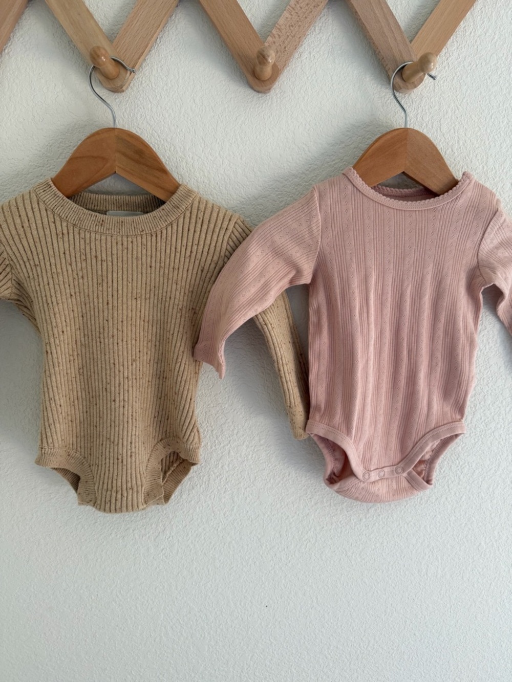 Two Baby Onesies